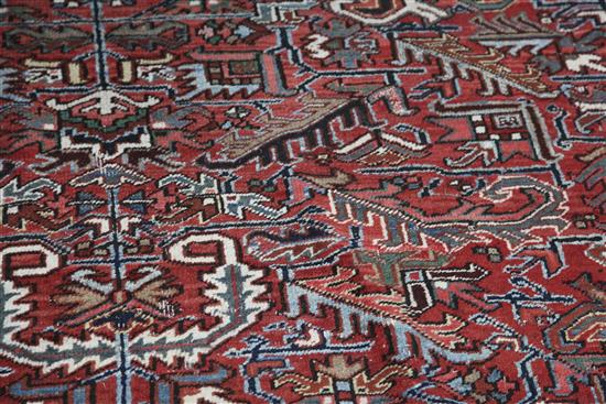 A Persian rug, 11ft 4in by 7ft 11in.